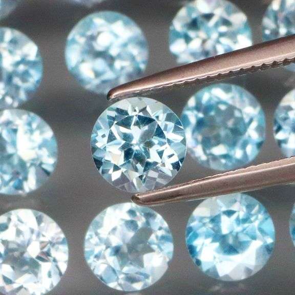 Matched! 20 piece 12.09ct full fire sky blue Topaz set!
