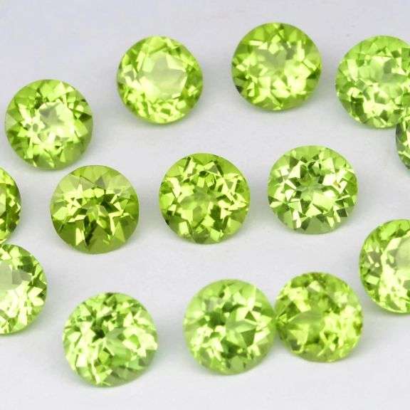 Dazzling 7.75ct untreated VS to IF grade apple green Peridot set!
