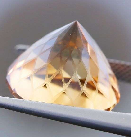 Intricately cut! 21.98ct REAL Imperial Topaz!