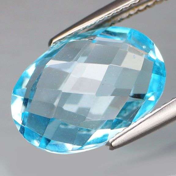 Double checker cut! 7.36ct Swiss blue Topaz!