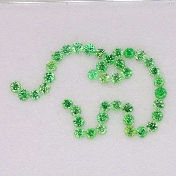 Simply adorable! 1.64ct Tsavorite Garnet set!