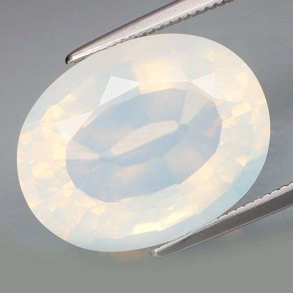 Glowing 8.66ct snow white Fire Opal!