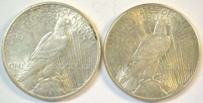 Frosty-white AU pair of better date Peace Silver Dollars from 1924-S & 1928-S