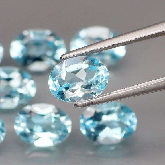 Glittering set of 8 full fire sky blue Topaz! 12.36 carats!