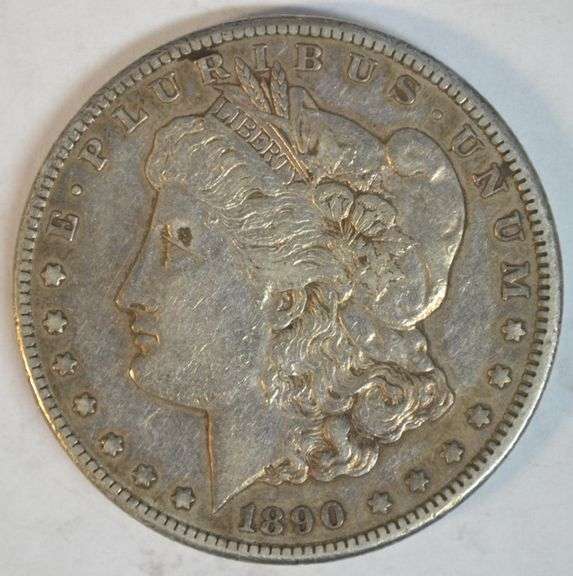 Original scarce 1890-CC Morgan Silver Dollar in sharp XF condition