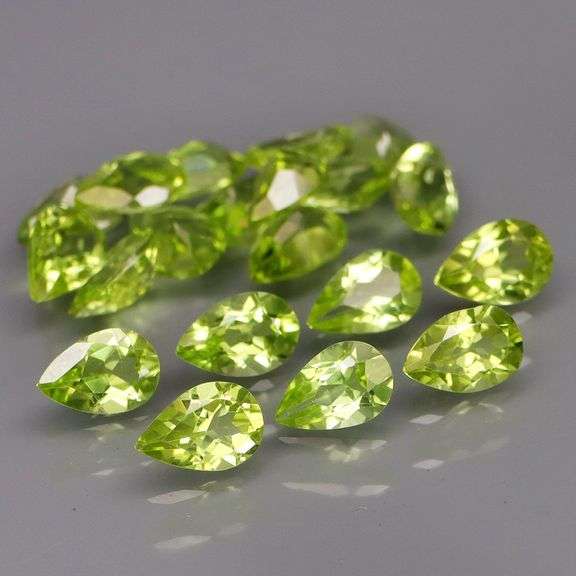 Dazzling 8.32ct untreated apple green Peridot set