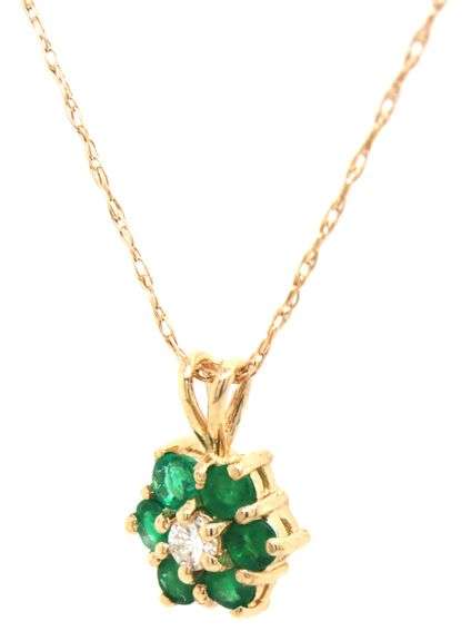 14kt Yellow gold emerald and diamond flower pendant on chain