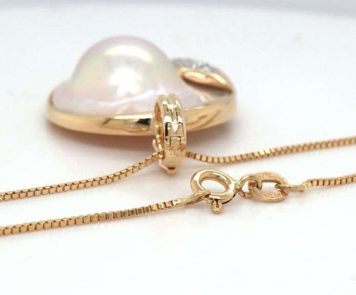 14kt Yellow gold Mabe pearl and diamond accent pendant on chain