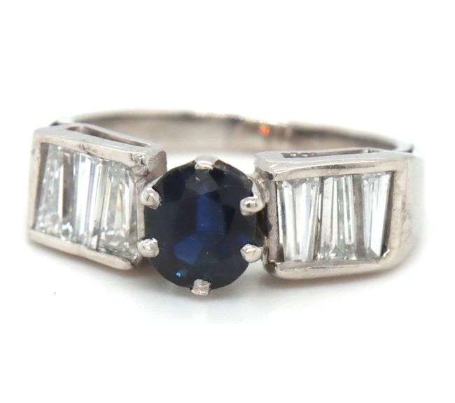 Blue sapphire and baguette diamond cocktail ring in Platinum