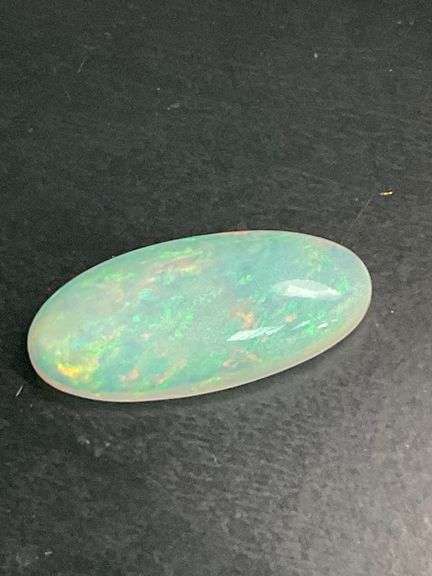 NATURAL OPAL- LOOSE- 17.54 CARAT. OVAL CABOCHON CUT