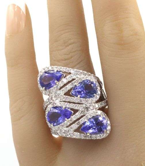 18kt White gold 10ctw Tanzanite and 2.85ctw diamond halo ring