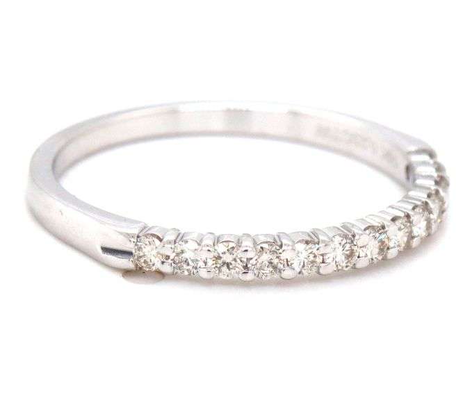 14kt White gold 0.23ctw shared prong diamond band