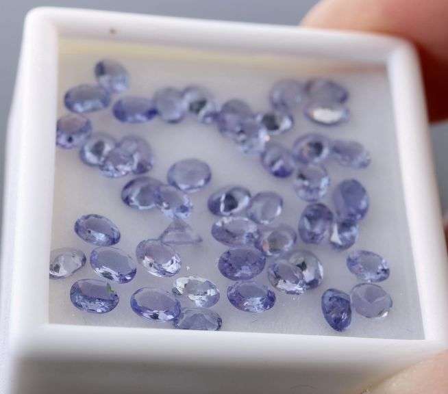 Heavy flashing! Untreated! 7.11ct oval cut Tanzanite set