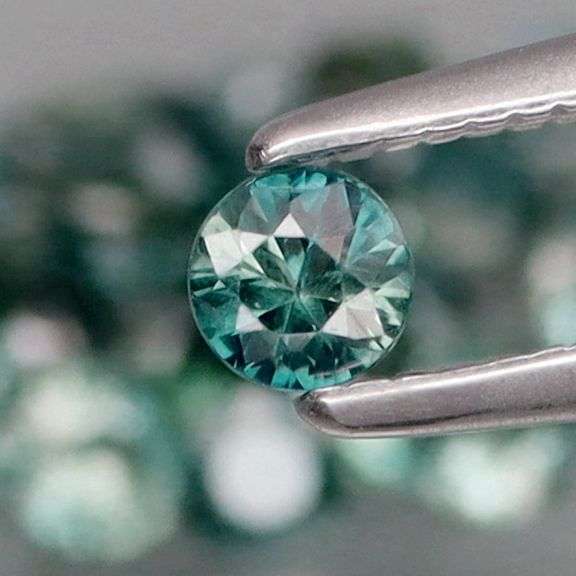 Heated only! 3.60ct blue green Sapphire set!