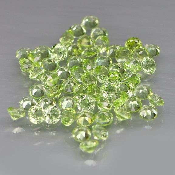 Dazzling 4.70ct untreated super clean apple green Peridot set