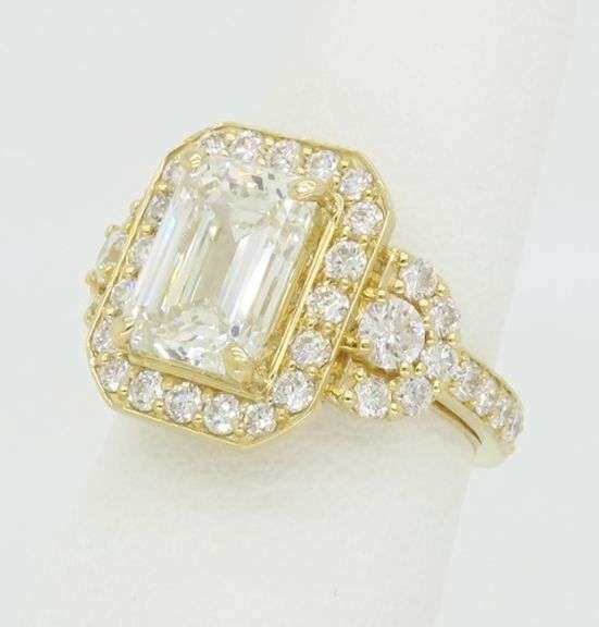 4.59CTW Emerald Cut Halo Diamond Ring in Yellow Gold