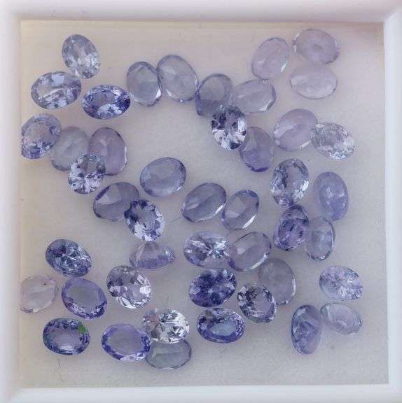 Heavy flashing! Untreated! 7.11ct oval cut Tanzanite set