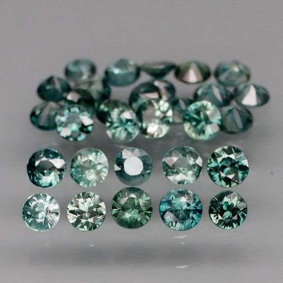 Heated only! 3.60ct blue green Sapphire set!