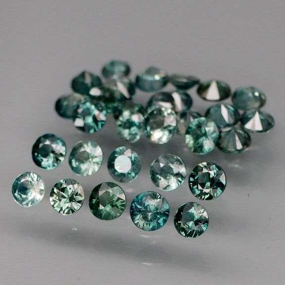 Heated only! 3.60ct blue green Sapphire set!