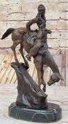 Chief Riding Horse on a Rock Bronze Sculpture