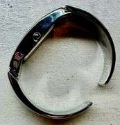 Modern Stainless Steel Blue Dial Cuff Watch Sleek Contemporary Design