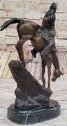 Chief Riding Horse on a Rock Bronze Sculpture