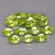Dazzling 8.32ct untreated apple green Peridot set