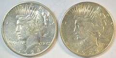 Frosty-white AU pair of better date Peace Silver Dollars from 1924-S & 1928-S