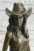 Hot Cast Cowgirl with Saddle Bronze Sculpture