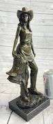 Hot Cast Cowgirl with Saddle Bronze Sculpture