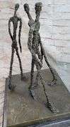 Three Walking Man Bronze Sculpture