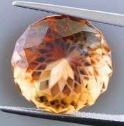 Intricately cut! 21.98ct REAL Imperial Topaz!