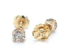 One pair of 14kt yellow gold top light brown round brilliant cut diamond stud earrings