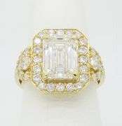 4.59CTW Emerald Cut Halo Diamond Ring in Yellow Gold