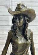 Hot Cast Cowgirl with Saddle Bronze Sculpture