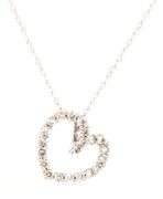 14kt White gold 0.20ctw open heart diamond pendant on chain