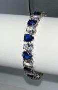 Stunning White Gold Plated 32.5 Ctw Simulated Sapphire and CZ Tennis Bracelet