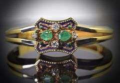 Incredible 18K Enamelled Bangle with Emeralds & Diamonds