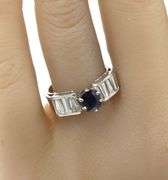Blue sapphire and baguette diamond cocktail ring in Platinum