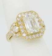 4.59CTW Emerald Cut Halo Diamond Ring in Yellow Gold