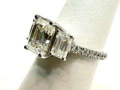 Sparkling 5.5 Ctw 3 Stone Emerald Cut Ice White Moissanite Ring