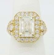 4.59CTW Emerald Cut Halo Diamond Ring in Yellow Gold
