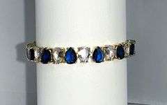 Stunning Yellow Gold Plated 32.5 Ctw Simulated Sapphire and CZ Tennis Bracelet