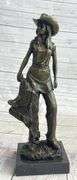 Hot Cast Cowgirl with Saddle Bronze Sculpture