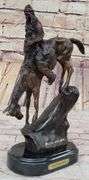 Chief Riding Horse on a Rock Bronze Sculpture