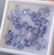 Heavy flashing! Untreated! 7.11ct oval cut Tanzanite set