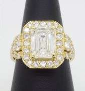 4.59CTW Emerald Cut Halo Diamond Ring in Yellow Gold