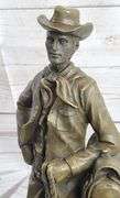 Cowboy with Rope Bronze Sculpture