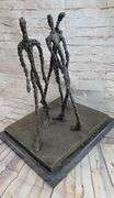 Three Walking Man Bronze Sculpture