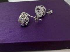 Beautiful Daily wear Circle earrings with center dancing moissanite in sterling silver